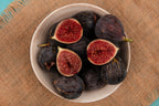 Brown Turkey fig cut open to show amber-toned flesh