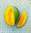 Gary Mango cut open showing golden yellow creamy flesh