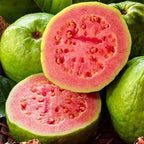 Guava cut open to show its pink flesh