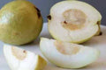 White Indonesian guava cut open to show its white flesh